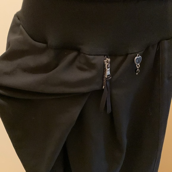 Rinascimento Black Asymmetrical Trousers – Chic Draped Designer Statement Pants - Picture 4 of 14